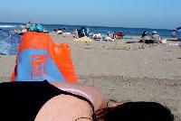 Candace lying on Malibu Lagoon State Beach
